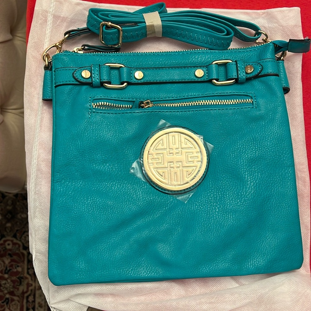 Turquoise bag crossbody-
New w tags